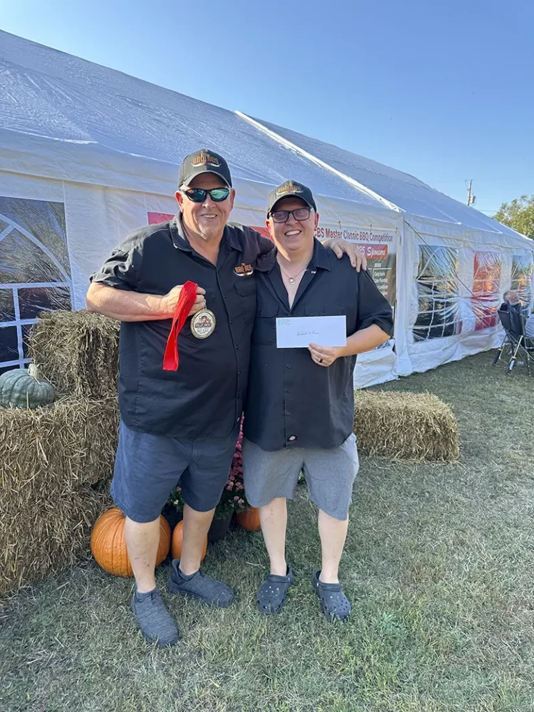 2025 Rolling Smoke BBQ Bash winning team of two men