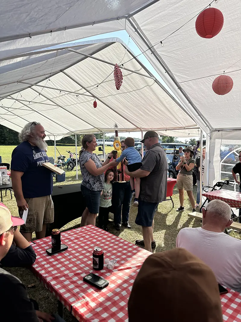 2025 Rolling Smoke BBQ Bash inside the tent with people